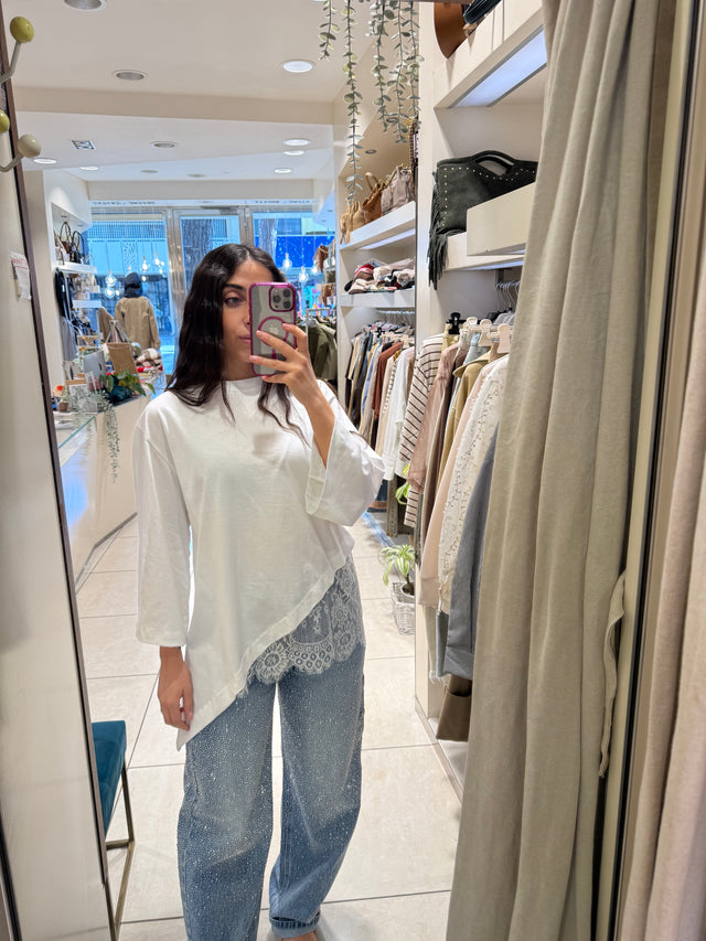 Maglia asimmetrica con pizzo