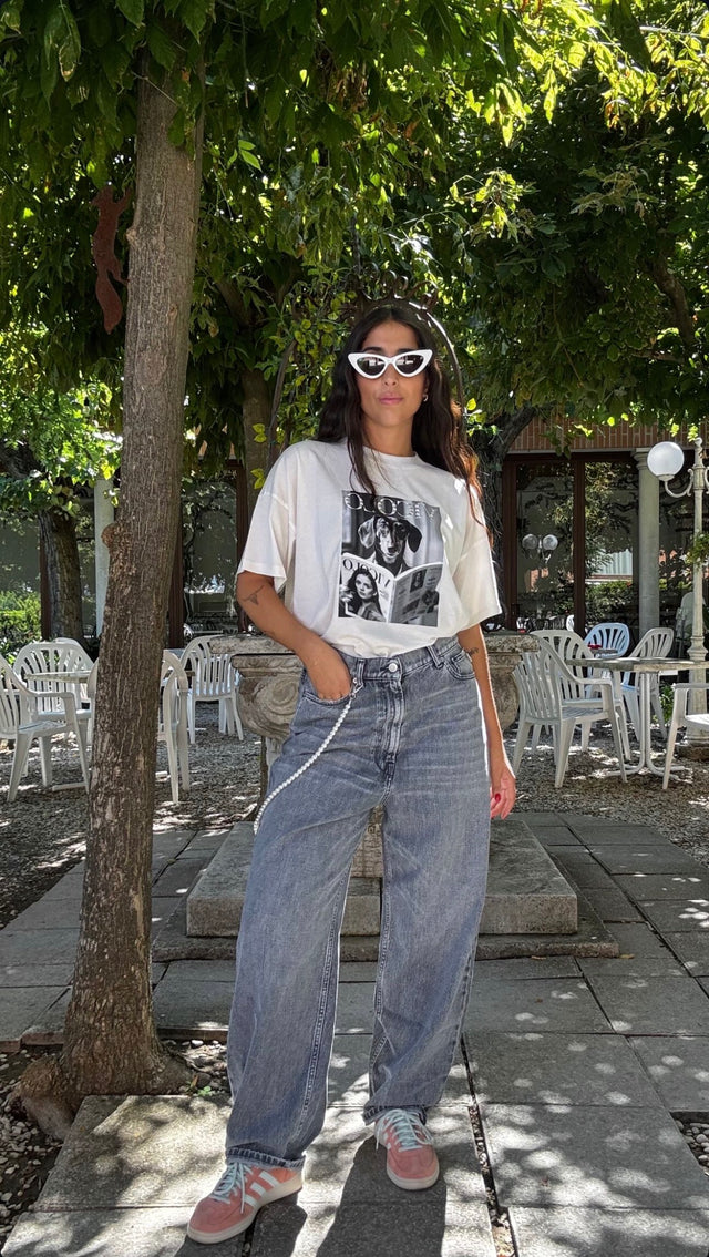 Jeans con catena in perle