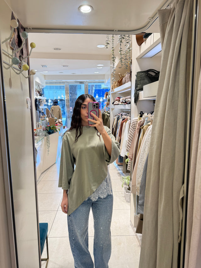 Maglia asimmetrica con pizzo