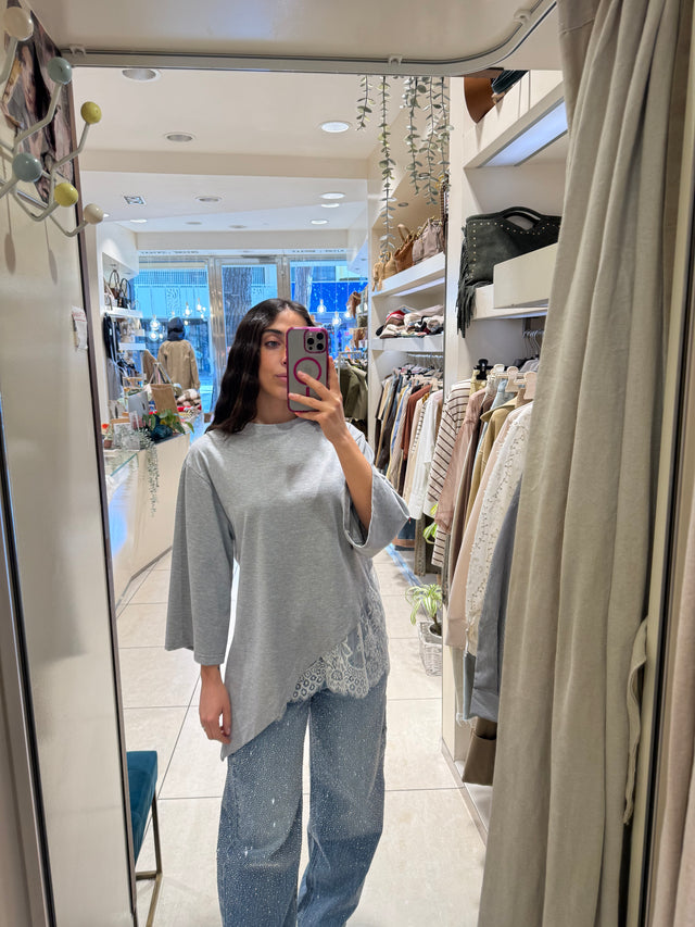 Maglia asimmetrica con pizzo